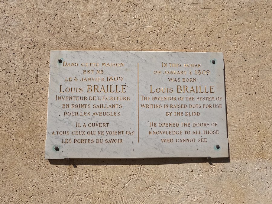 Plaque reads : IN THIS HOUSE ON JANUARY 4 1809 WAS BORN Louis BRAILLE THE INVENTOR OF THE SYSTEM OF WRITING IN RAISED DOTS FOR USE BY THE BLIND.
HE OPENED THE DOORS OF KNOWLEDGE TO ALL THOSE WHO CANNOT SEE