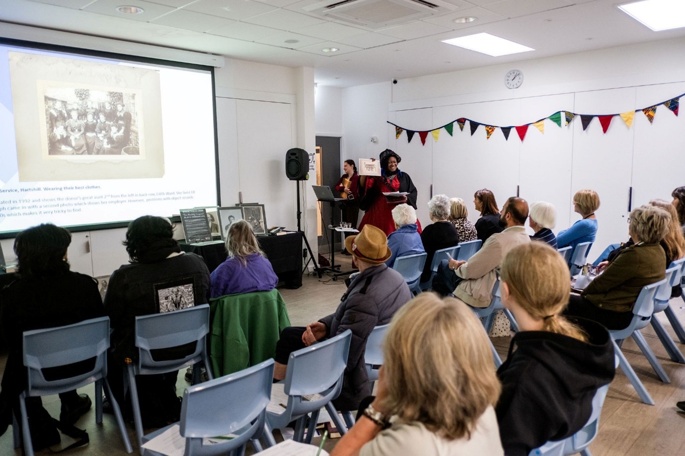 Gabriella Gay, PHD student, poet and founder of Arts Organisation Kwanzaa Collective, sharing her research at Brampton Museum. Photographs by Jenny Harper.

