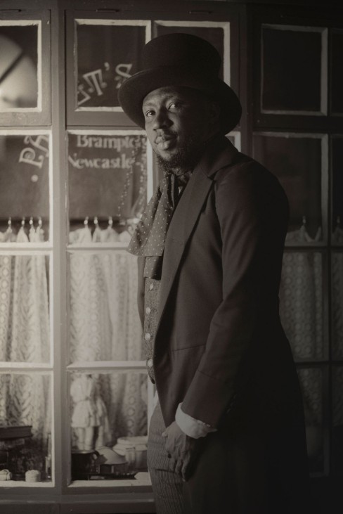 Costumed characters in the Victorian Street scene