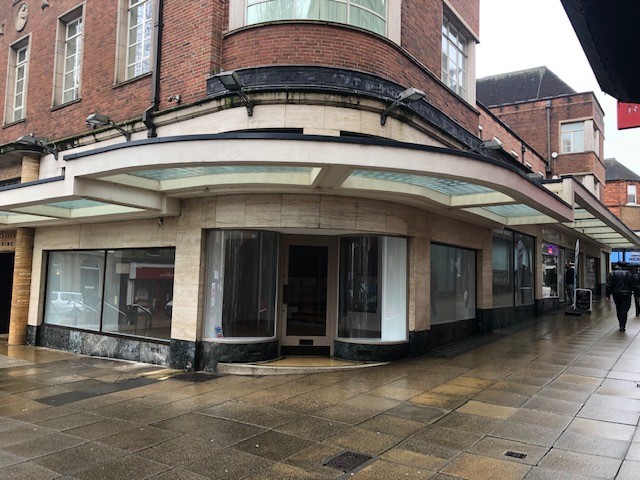 A photo of the shop front of unit 13 and 14 of the Lancaster Building