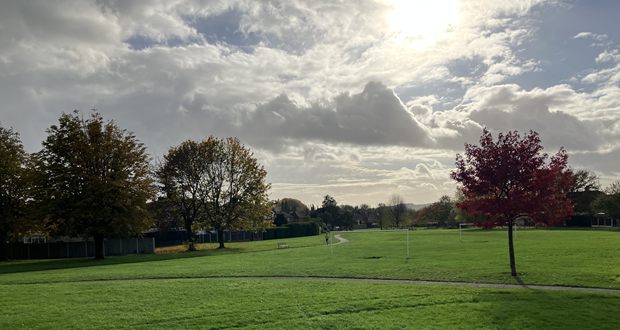 The image shows the sun shining on the Dingle at Bradwell.