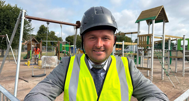 Image shows councillor Ben Simpson at the play area under construction.,