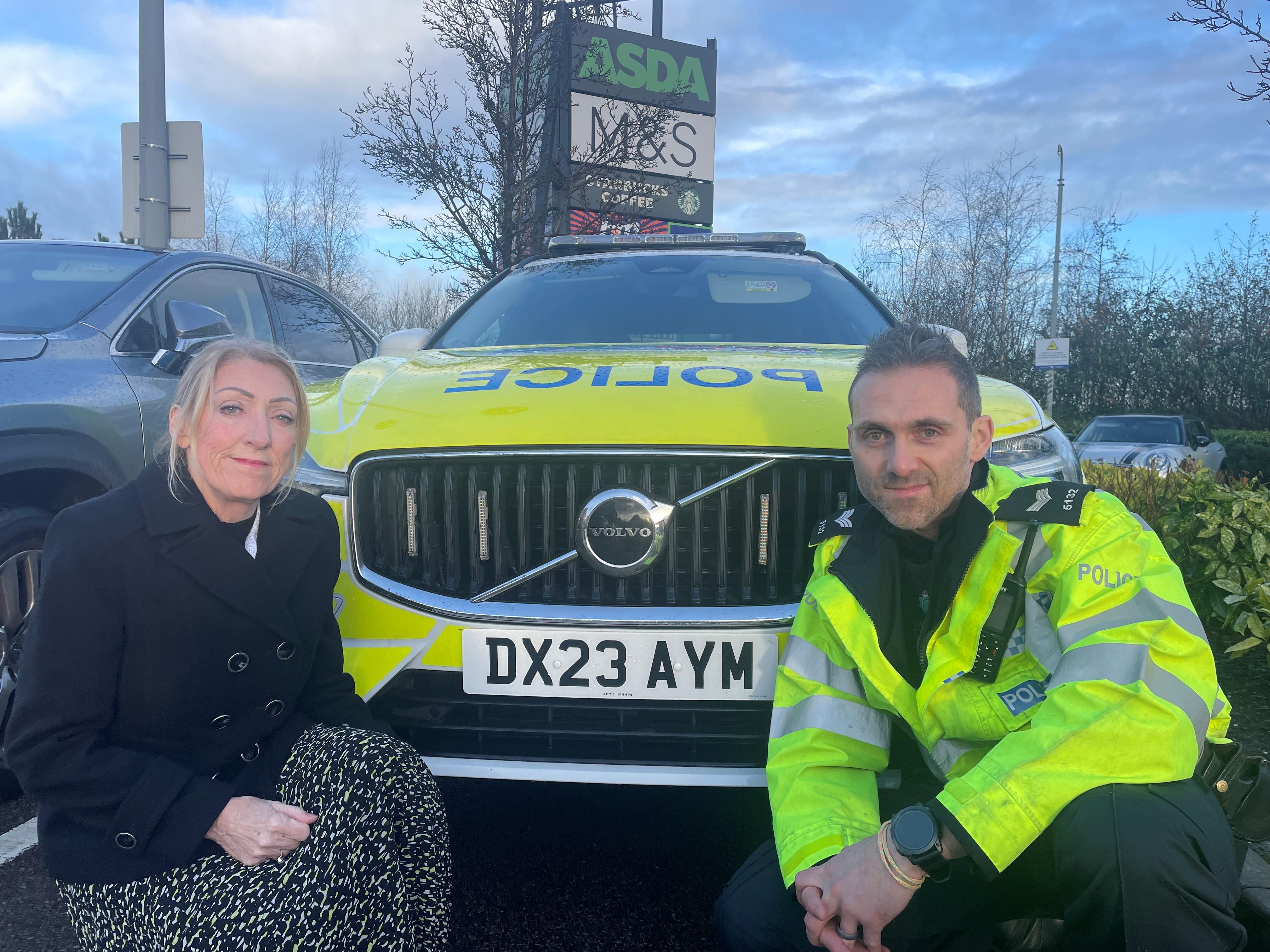 Cabinet member Gill Heesom and Sergeant Matt Holdcroft at Wolstanton retail park.