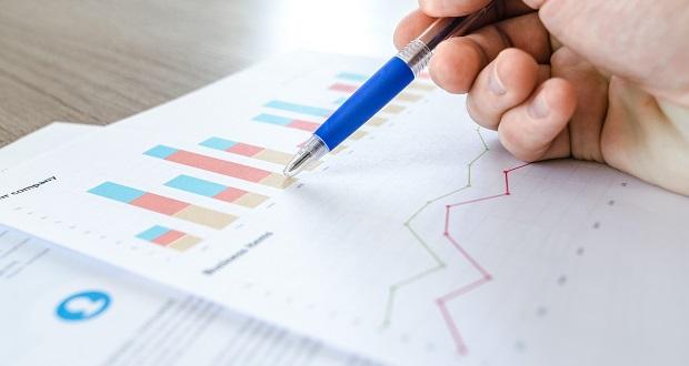 The image shows someone working on a financial foercast.