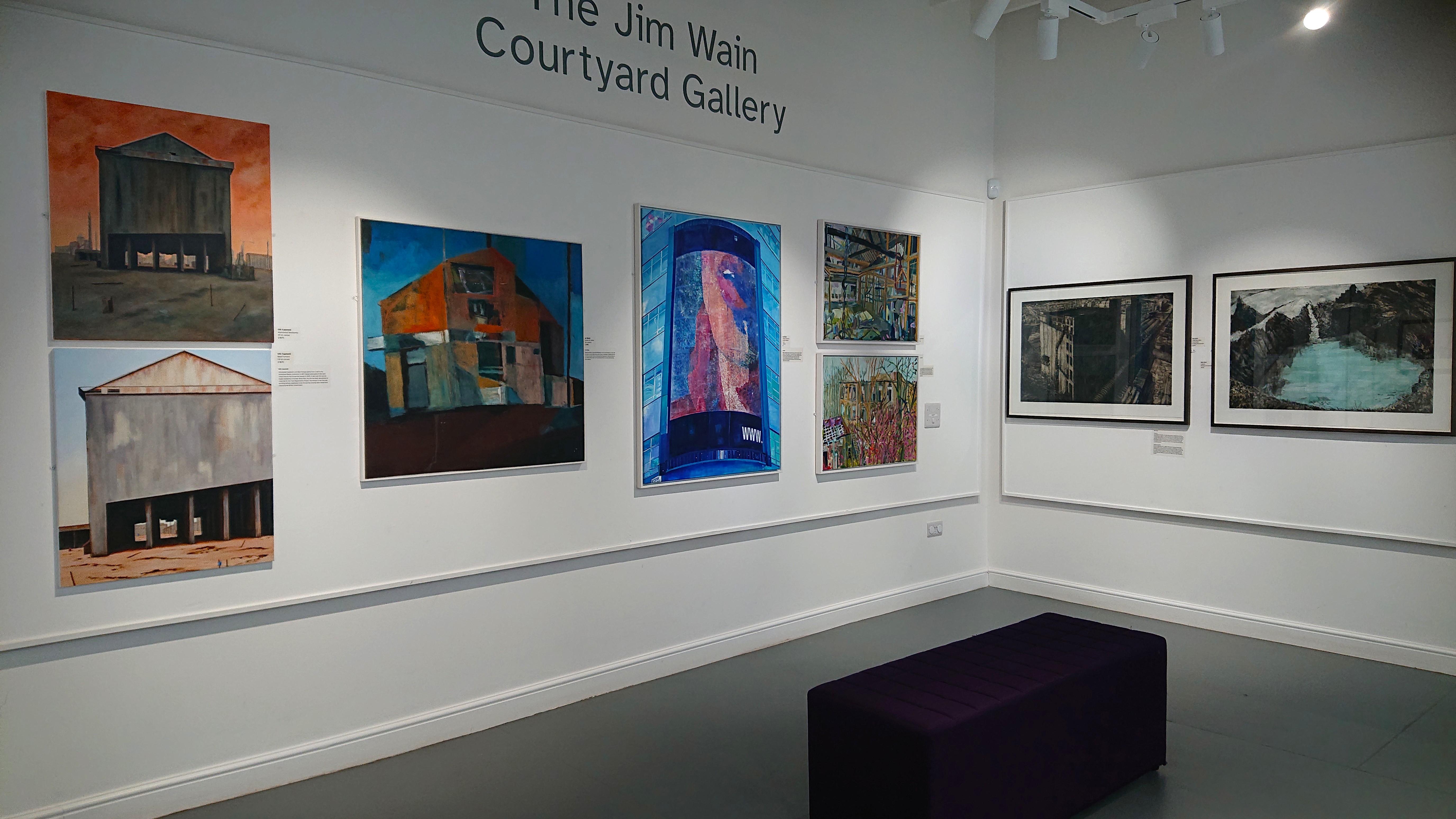 Picture of art collection on the walls at the museum