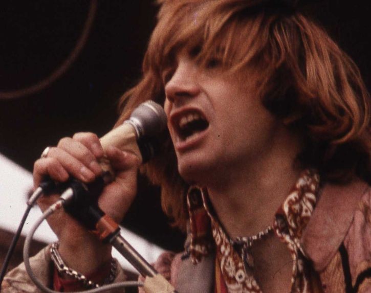 Screaming Lord Such sings into a microphone