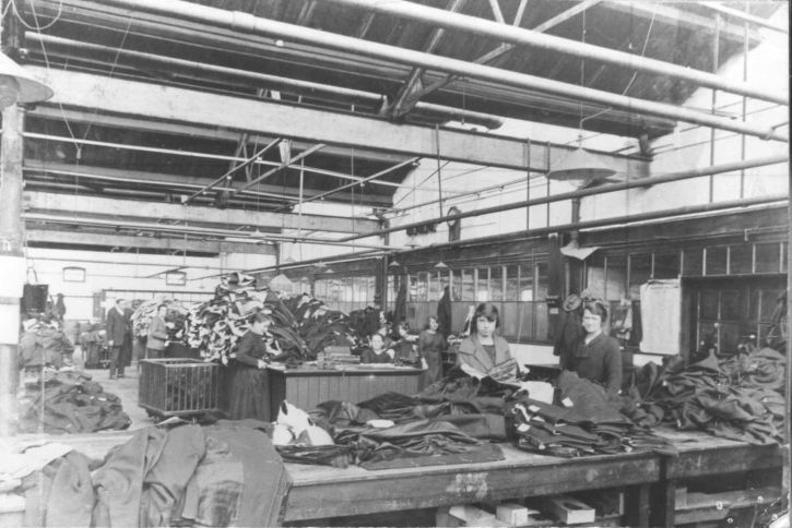 Black and white photo of inside a mill
