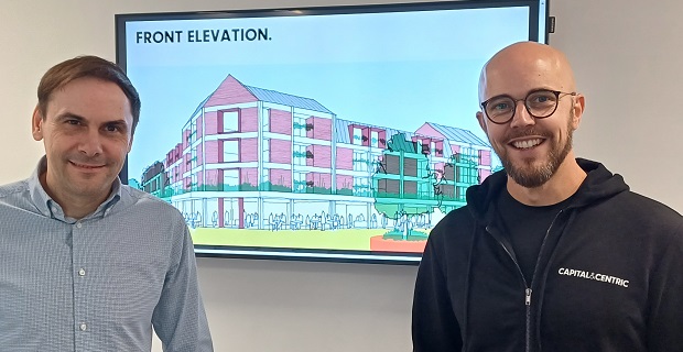 The image shows Council leader Simon Tagg, left, and C&C Joint MD John Moffat, are pictured with an artist's impression of the York Place redevelopment.