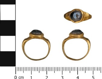 Several images of an historic gold ring set with a black stone, shown to scale with rulers